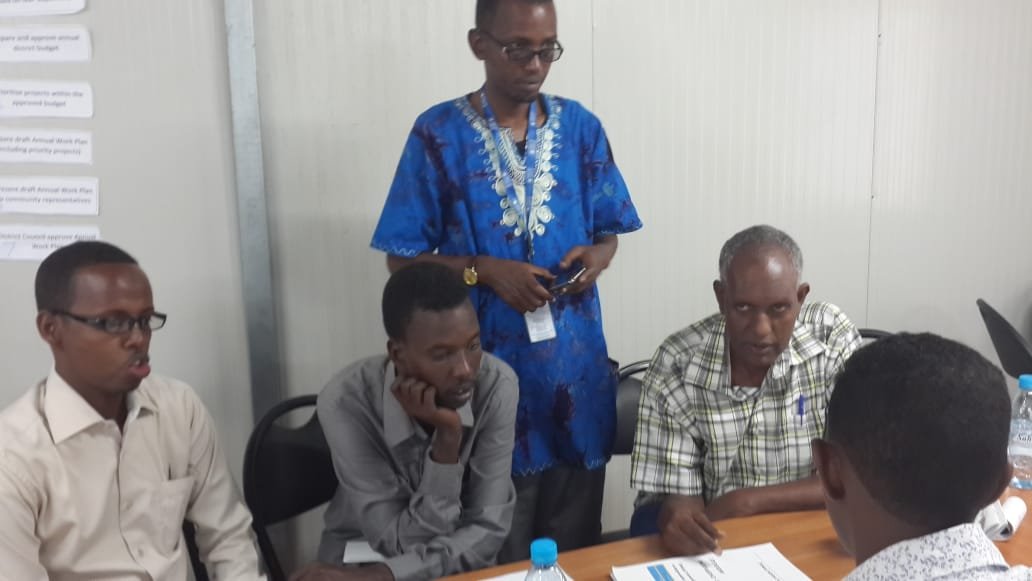 Facilitator supporting a small working group